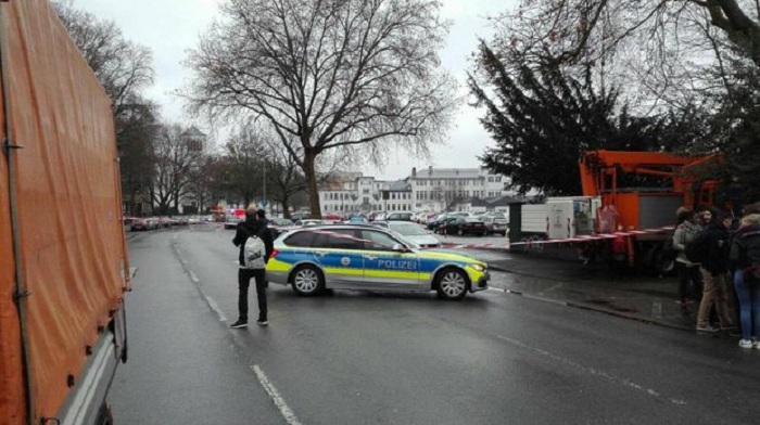 Gunman on loose in school as cops swoop